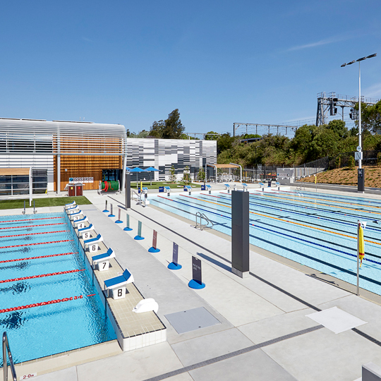 Outdoor image of Ashfield Aquatic Centre overlooking 50m pool and outdoor program pool